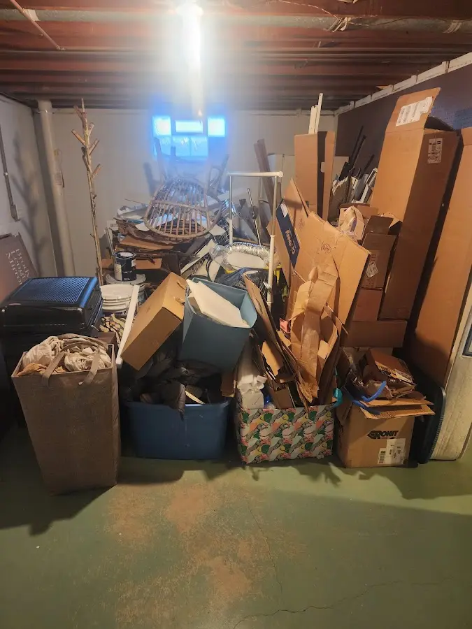 Roll-off dumpster container at job site for 8 Yard Dumpster Rental in Staples